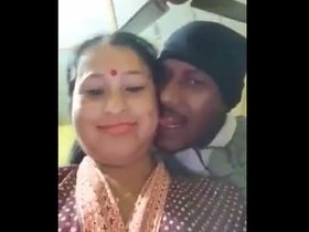 A young cousin and Indian aunt have playful encounter in a rural setting