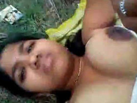 Village girl's big tits get attention in outdoor encounter