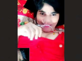 A Punjabi woman flaunts her large breasts during a video chat