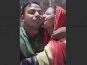 Indian couple shares intimate moments in rural setting