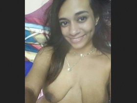 Large-breasted woman takes a bath