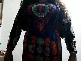 Sensual kissing in a homemade kitchen video featuring a hot Indian bhabi