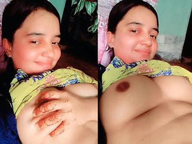 Cute Indian girl with large breasts performs a live show