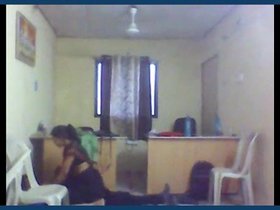 Elder wife engages in intimate encounter with young colleague in workplace video