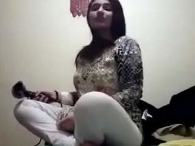 Popular girl strips down to nude by herself