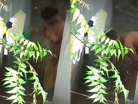 Hidden camera captures Indian neighbor's reaction to busty bhabhi's nude bathing