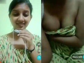 Indian bhabi flaunts her large breasts on camera