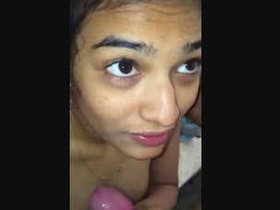 An Indian college student enjoys giving oral pleasure to her boyfriend