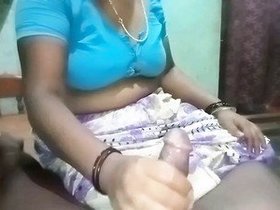 Elder Indian aunt performs a sensual oral sex act on her younger partner