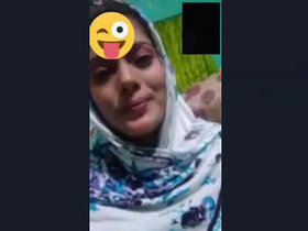 A pretty Indian novice shares her beauty in a seductive display