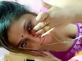 Indian wife's live performance of ample bosom