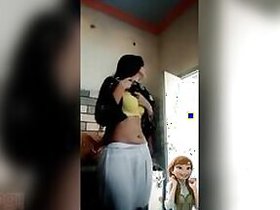 Girl exposes her tits and ass in front of her lover Desi in XXX video