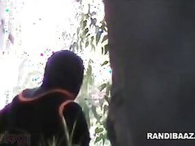 Hidden live camera catches an adult teenage girl having sex outdoors behind her house