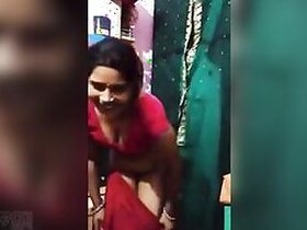 Sweet housewife Desi takes off her sexy sari to show off her bald pussy XXX