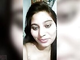 Charming Desi virgin shows her XXX breasts to the camera.