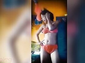Tiny Desi takes off her underwear and teases her body while dancing