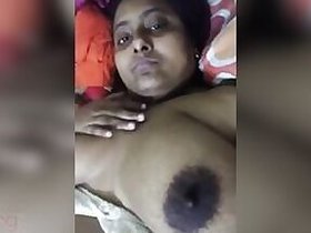 Lush-chested Bangladeshi girl shows off her big naked tits for the camera