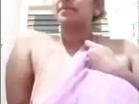 Desi's roommate Auntie shows on a video call