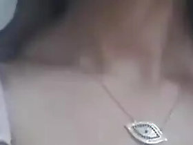 Naughty black girl loves to suck her own tits while rubbing her pussy