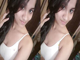 Cute Indian girl takes her clothes off and shows off her big tits